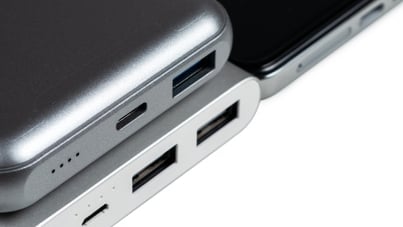Portable power banks stacked on top of eachother