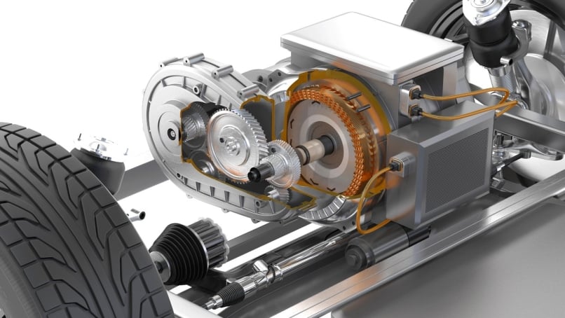 Cutaway illustration of an electric vehicle motor and gearbox connected to the front wheel.
