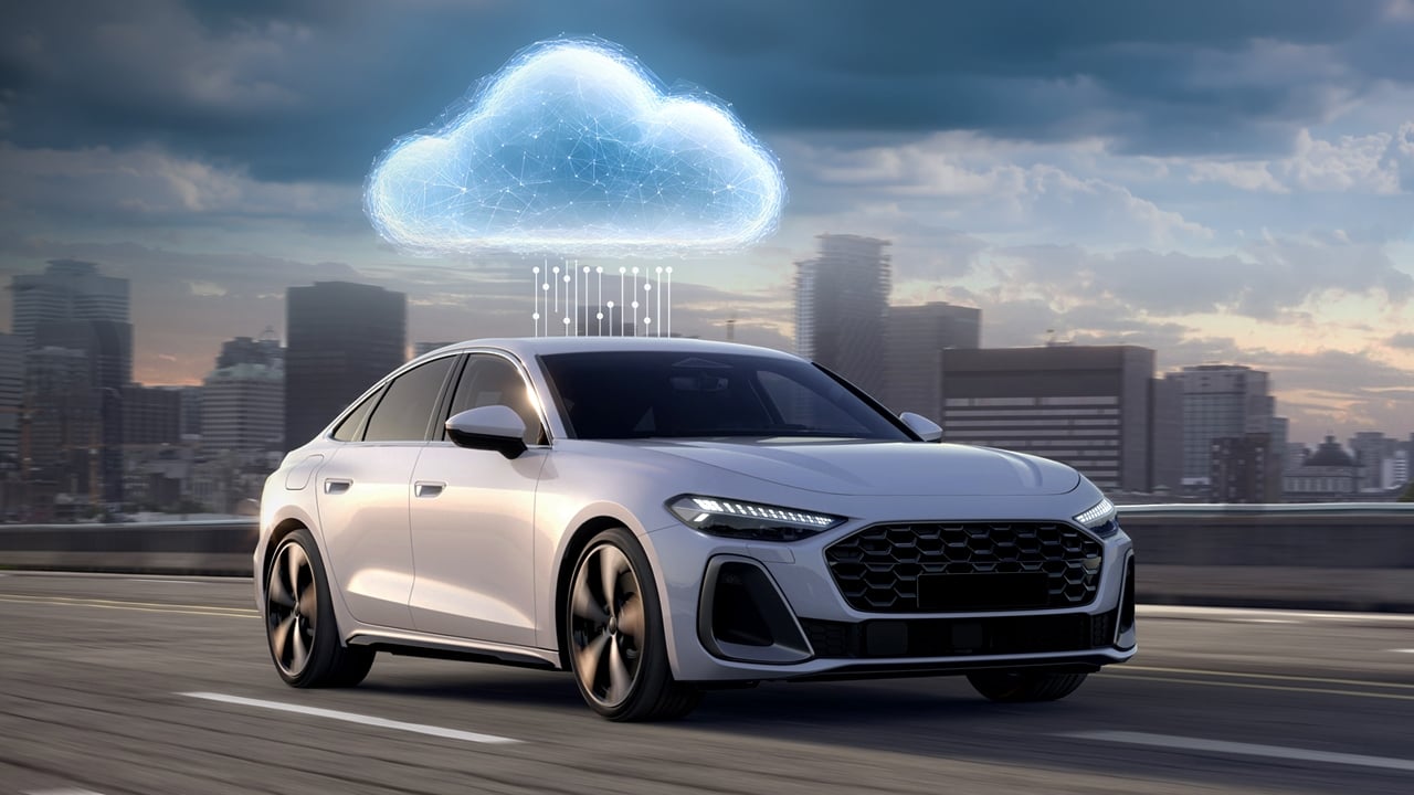 ADAS Cloud Development Car running on road with a cityscape background and a cloud graphic on top of car connected with vertical connectivity lines indicating ADAS cloud development.
